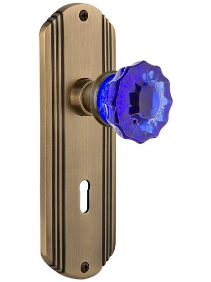 Streamline Deco Mortise Lock Set with Colored Fluted Crystal Glass Knobs Cobalt Blue in Antique Brass.